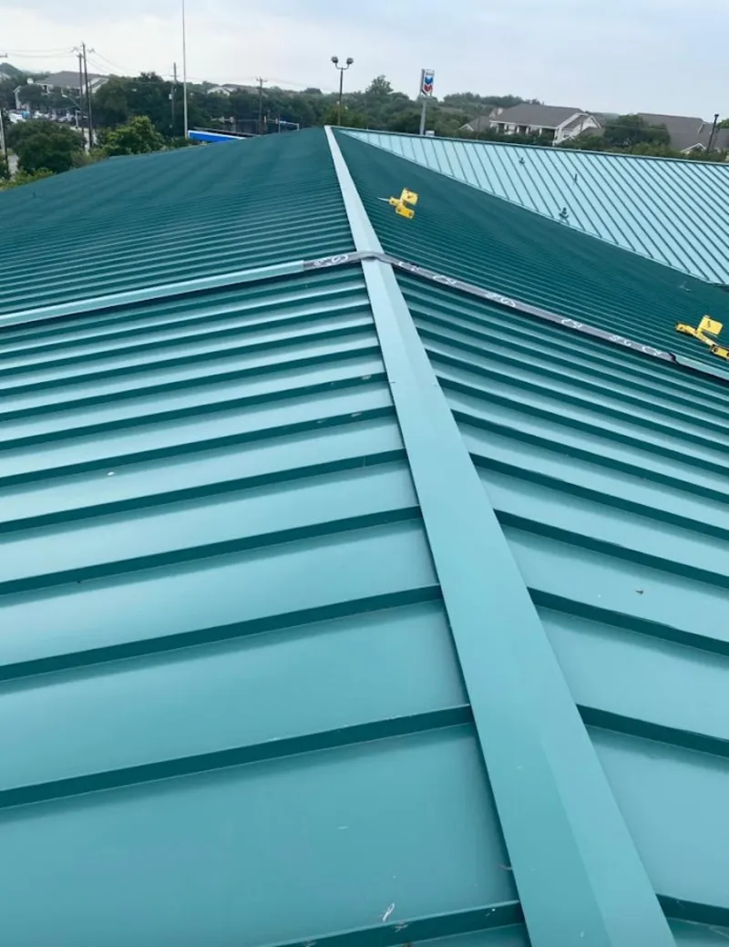 Green commercial metal roof ridge and valley for Metal Roof Repair in Lehigh Acres